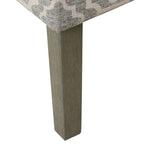 Sillón geométrico Ash Gray con reposabrazos curvos