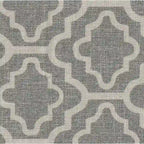 Sillón geométrico Ash Gray con reposabrazos curvos