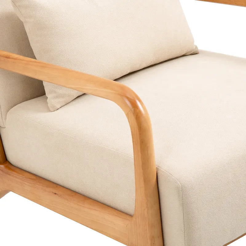 Sillón decorativo tapizado en tela con patas de madera