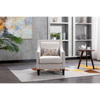 Sillón tapizado en lino con tachuelas y patas de madera maciza