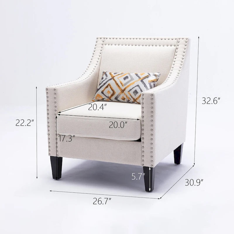 Sillón tapizado en lino con tachuelas y patas de madera maciza