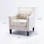 Sillón tapizado en lino con tachuelas y patas de madera maciza