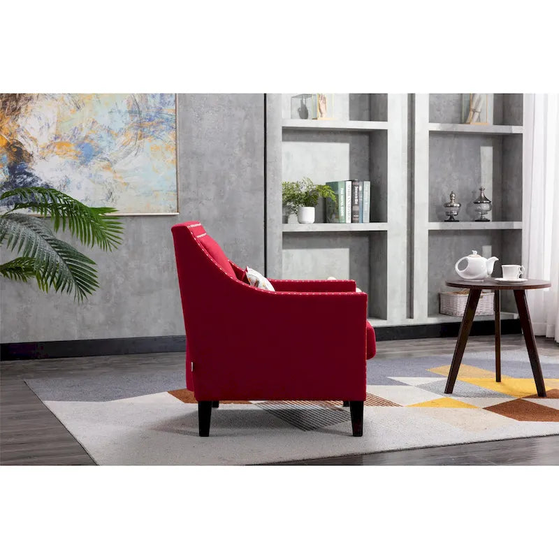 Sillón tapizado en lino con tachuelas y patas de madera maciza