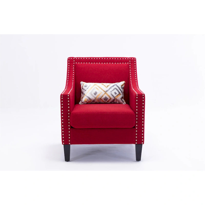 Sillón tapizado en lino con tachuelas y patas de madera maciza