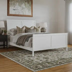 Cama de plataforma de perfil bajo de madera maciza Portland con piecera a juego