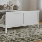 Cama de plataforma de perfil bajo de madera maciza Portland con piecera a juego