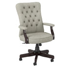 Sillón de oficina con respaldo alto, capitoné y reposabrazos