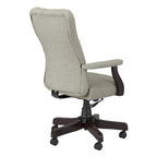 Sillón de oficina con respaldo alto, capitoné y reposabrazos